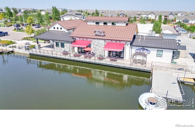 exterior space with a water view