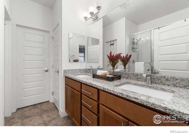 bathroom featuring vanity and walk in shower