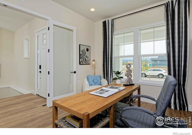 office area featuring light hardwood / wood-style floors