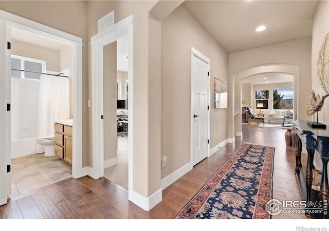 entryway featuring hardwood / wood-style flooring