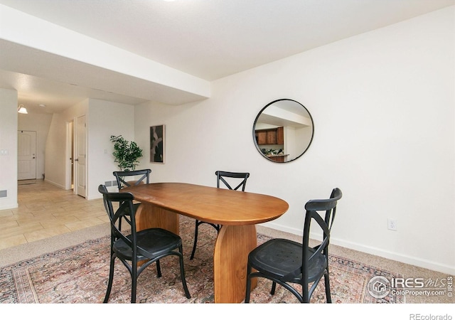 view of tiled dining space