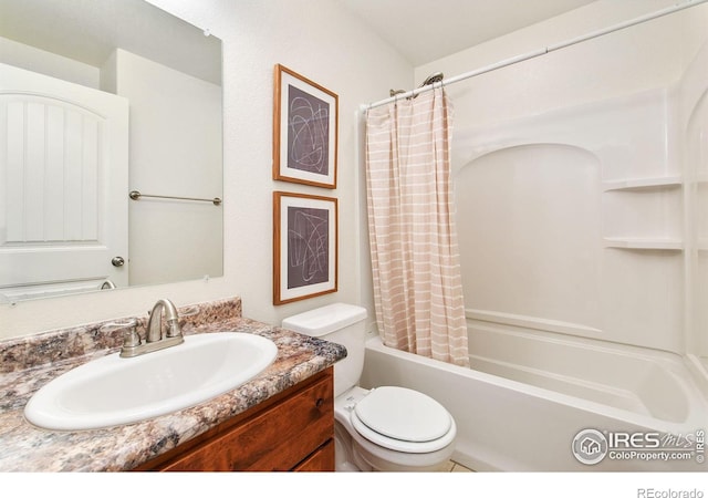 full bathroom featuring vanity, toilet, and shower / tub combo