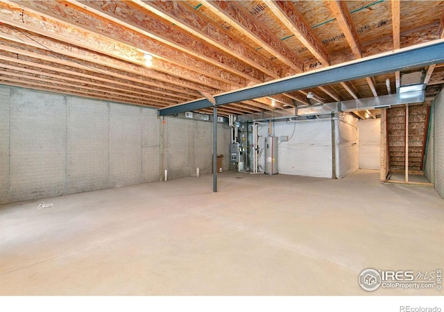 basement featuring water heater