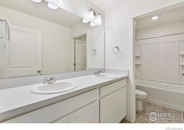 full bathroom with toilet, tile patterned flooring, vanity, and shower / bathtub combination