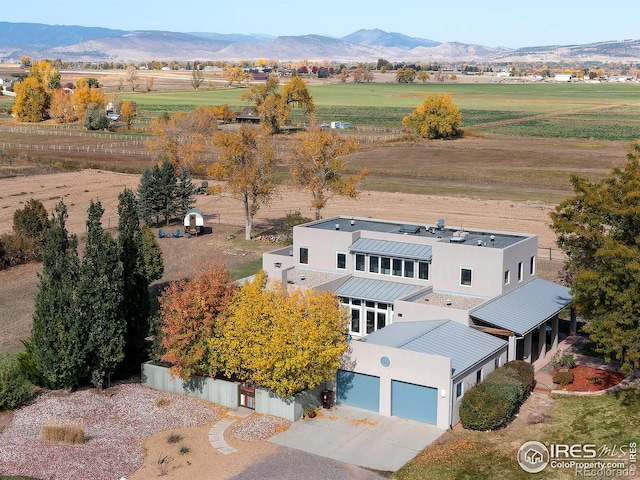 aerial view featuring a mountain view and a rural view