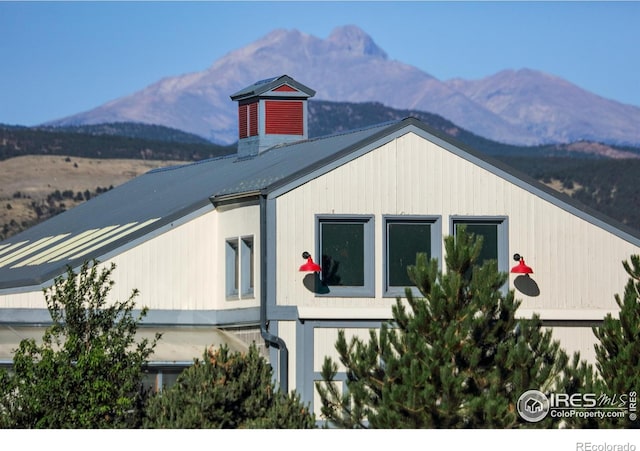 view of side of property featuring a mountain view