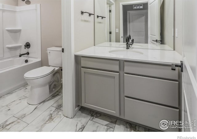 full bathroom featuring toilet, vanity, and bathtub / shower combination