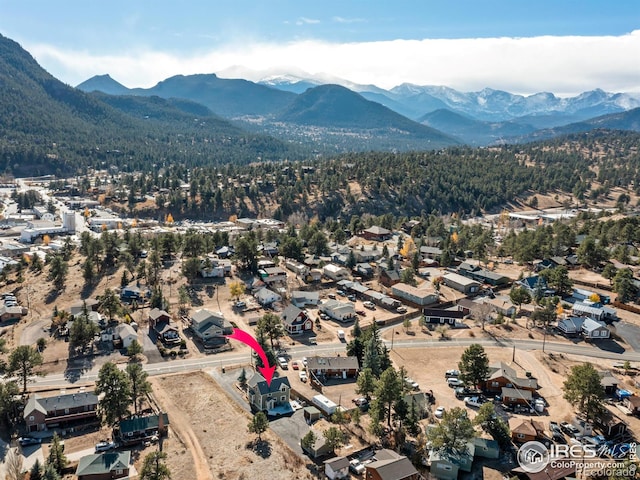 bird's eye view with a mountain view