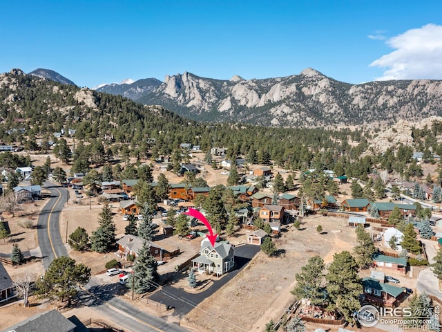 bird's eye view with a mountain view