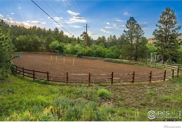 view of community with a rural view