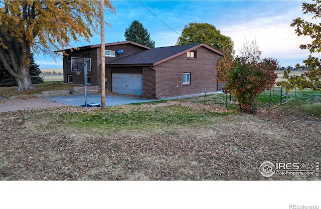 view of property exterior featuring a garage