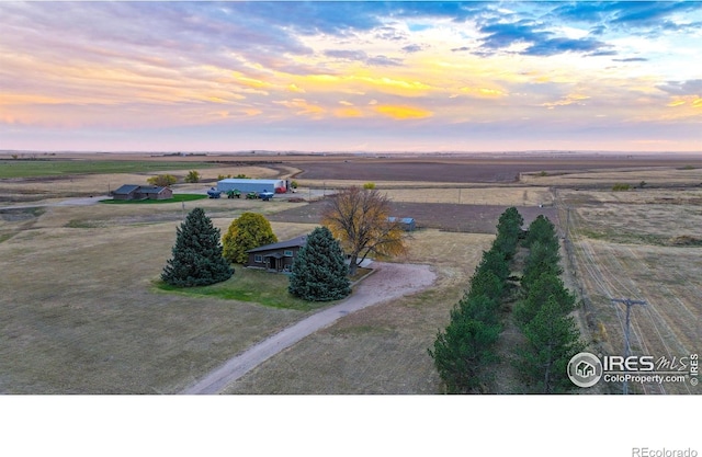 aerial view at dusk with a rural view