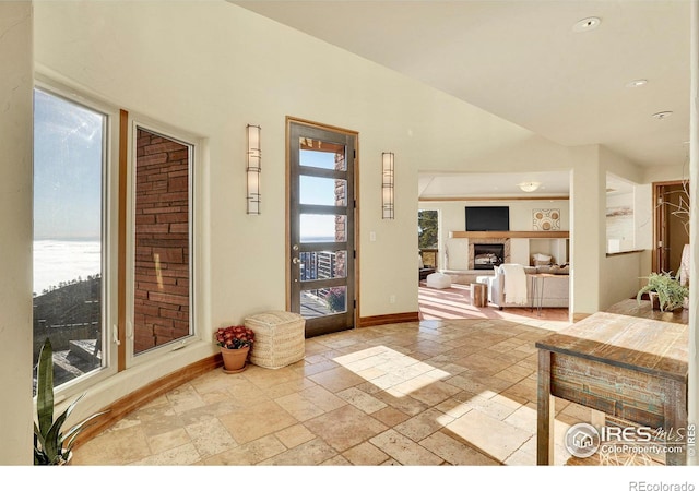 foyer featuring plenty of natural light