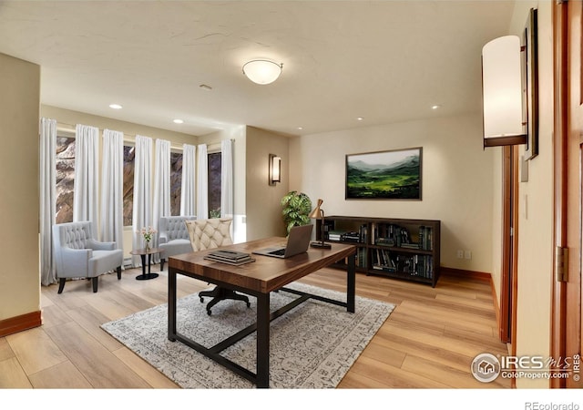 interior space featuring light hardwood / wood-style flooring and a wealth of natural light