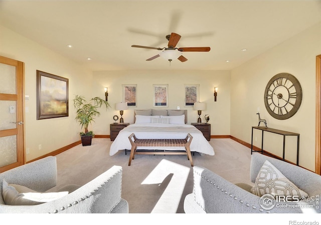 bedroom featuring ceiling fan and light colored carpet