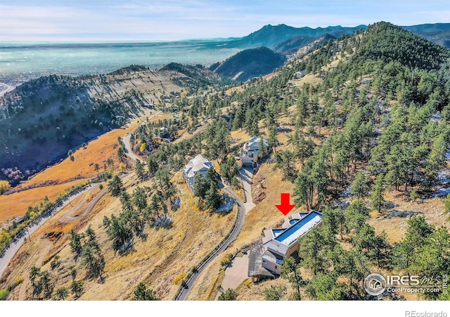 drone / aerial view featuring a mountain view