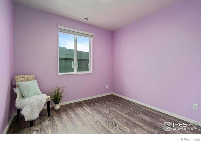 living area featuring hardwood / wood-style flooring