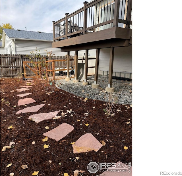 view of yard with a wooden deck