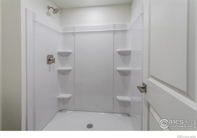 bathroom featuring walk in shower