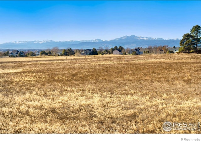 view of mountain feature featuring a rural view