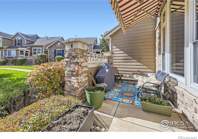 6220 Salvia St, Arvada, CO 80403 - view of patio with a residential view