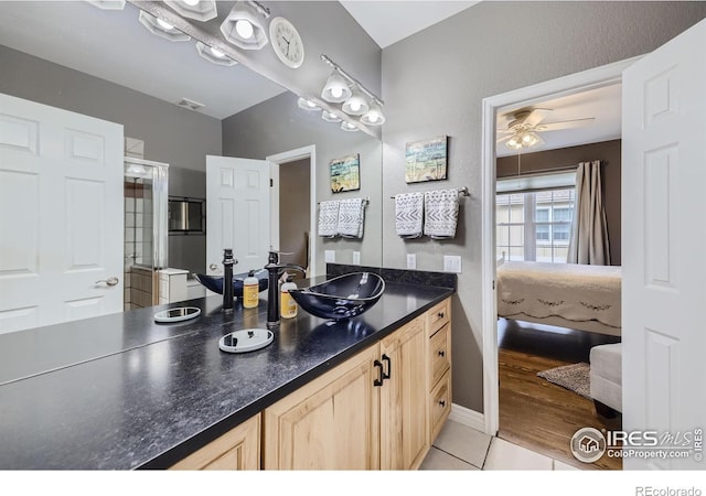 bathroom featuring vanity, ceiling fan, and hardwood / wood-style floors