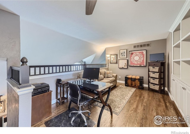 office area with lofted ceiling, dark hardwood / wood-style floors, and ceiling fan