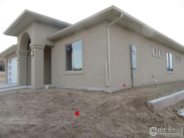 view of home's exterior with a garage