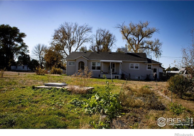 317 Second St, Roggen, CO 80652 - ranch-style home featuring stucco siding and fence