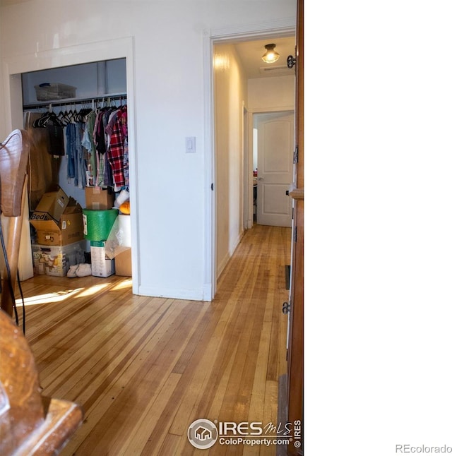 hall featuring light hardwood / wood-style floors