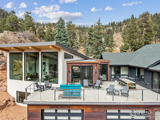 exterior space featuring an outdoor hangout area