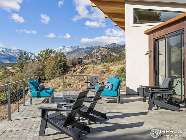 view of patio / terrace with a mountain view