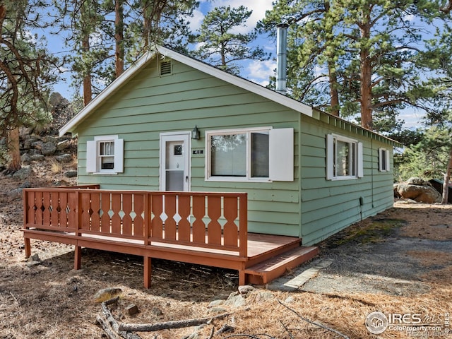 view of front of house with a wooden deck