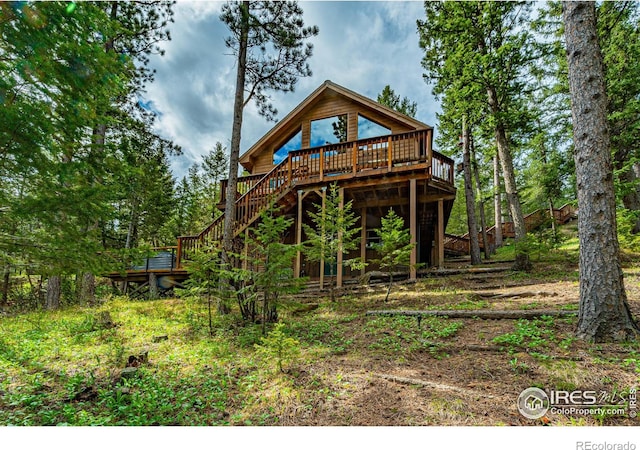 743 Hickory Dr, Lyons, CO 80540 - rear view of property with stairs and a deck