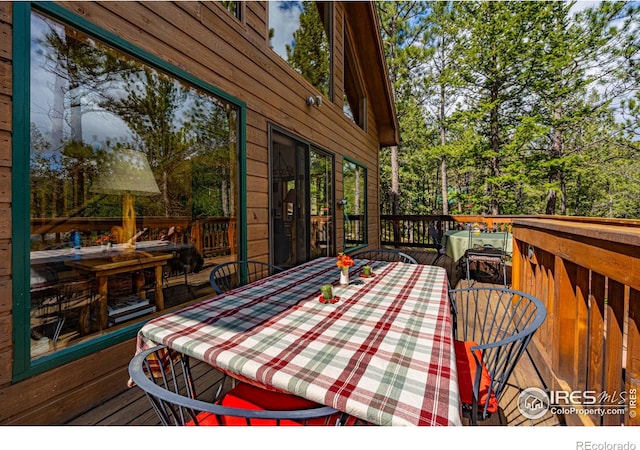 743 Hickory Dr, Lyons, CO 80540 - wooden terrace with outdoor dining space