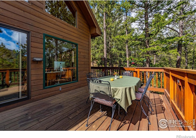 743 Hickory Dr, Lyons, CO 80540 - wooden terrace featuring outdoor dining area