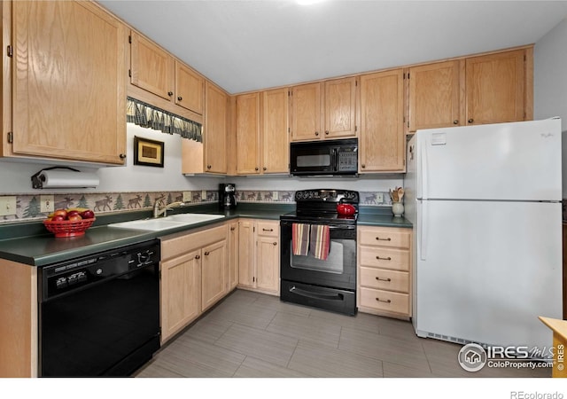 743 Hickory Dr, Lyons, CO 80540 - kitchen with black appliances, a sink, dark countertops, and light brown cabinets