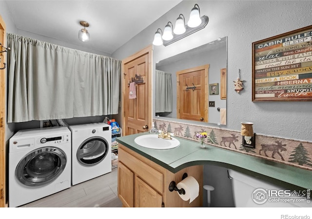 743 Hickory Dr, Lyons, CO 80540 - bathroom with washing machine and dryer and vanity