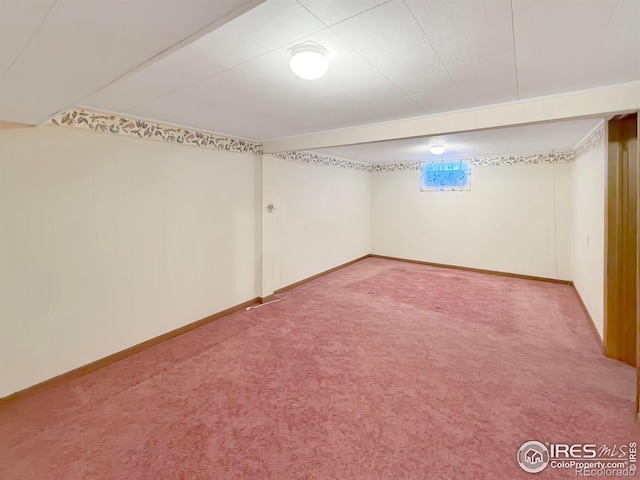 below grade area with carpet floors and baseboards