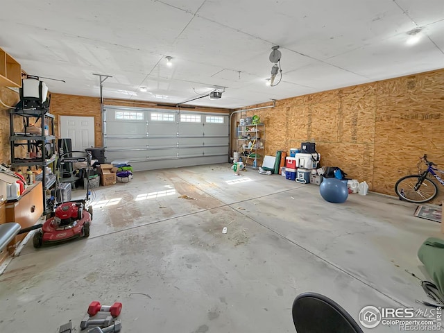 garage featuring a garage door opener