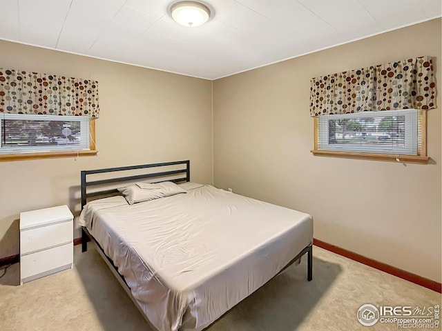 654 W Strohm St, Haxtun, CO 80731 - bedroom with light carpet and baseboards