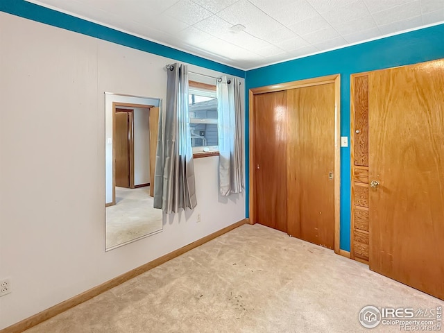 654 W Strohm St, Haxtun, CO 80731 - unfurnished bedroom featuring carpet flooring and baseboards