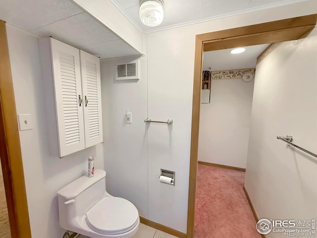 654 W Strohm St, Haxtun, CO 80731 - bathroom with toilet and baseboards