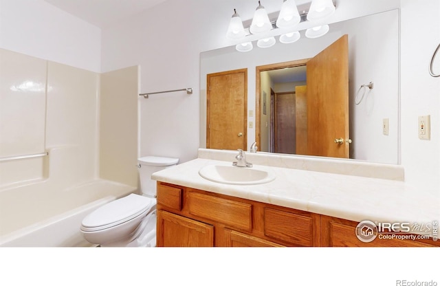 full bathroom featuring vanity, toilet, and shower / bathtub combination