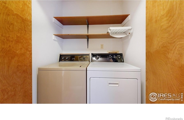 laundry room featuring washer and clothes dryer