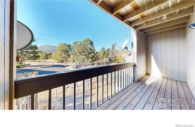 balcony featuring a mountain view