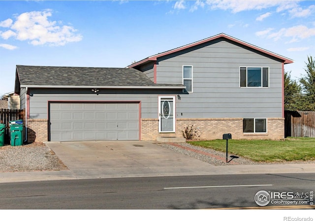 split level home with a garage