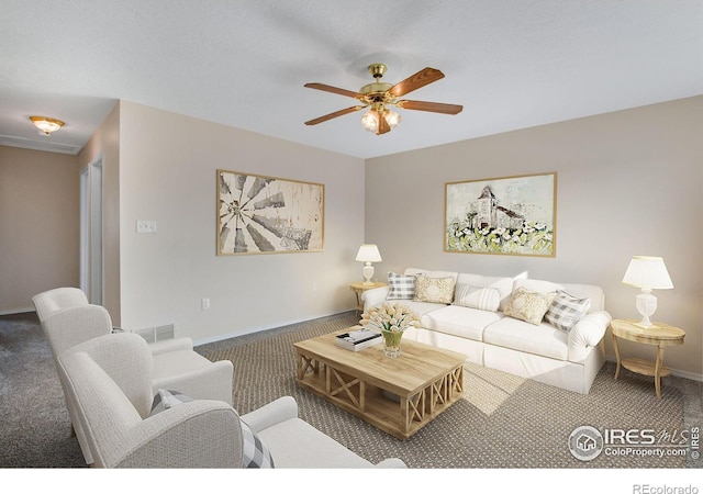 carpeted living room with ceiling fan