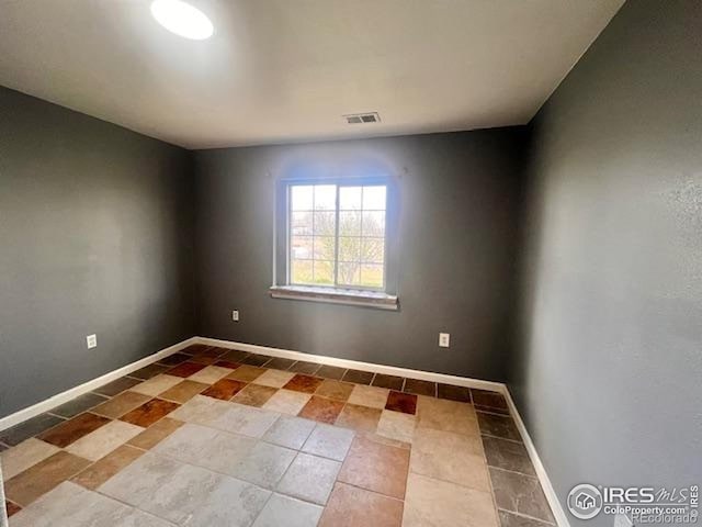 18542 County Road 8, Wiggins, CO 80654 - unfurnished room with baseboards