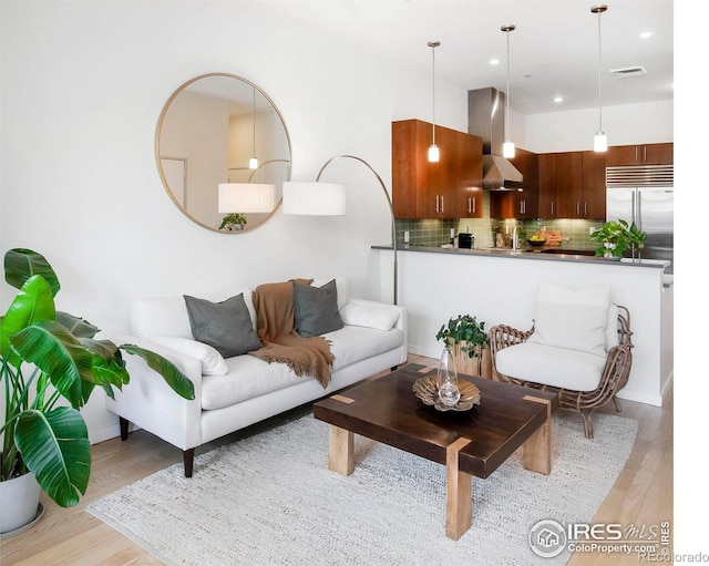 living room featuring light hardwood / wood-style floors